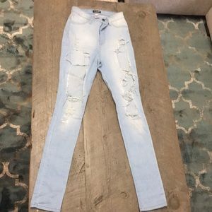 High waisted see distressed jeans